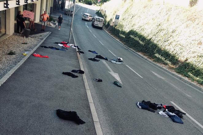 Clothes, electronics and other items litter the street in Nitra, Slovakia, after a woman threw her partner’s belongings from a sixth-floor flat during a domestic row.