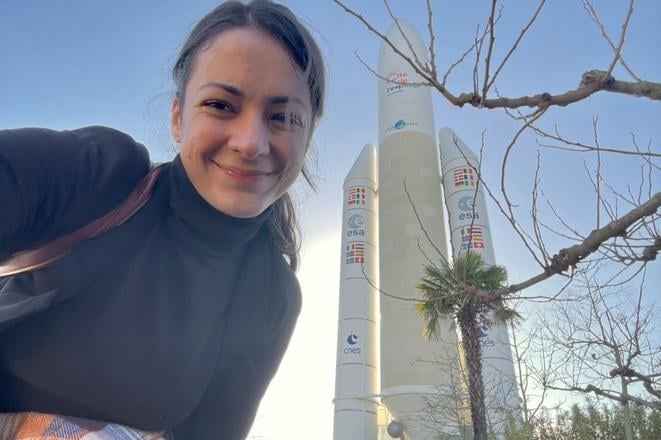 LENKA TKÁČOVÁ is co-founder of the Slovak branch of the Women in Aerospace initiative, which aims to promote women’s work in the space sector. Behind her is the Ariane 5 rocket.