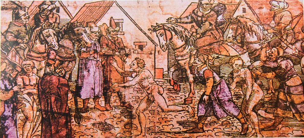 Turci predávajú obyvateľov obsadenej dediny do otroctva (kolorovaný drevoryt zo 16. storočia).