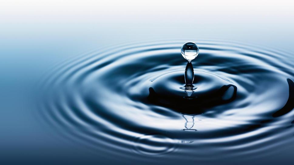 Water surface after collision with water drop