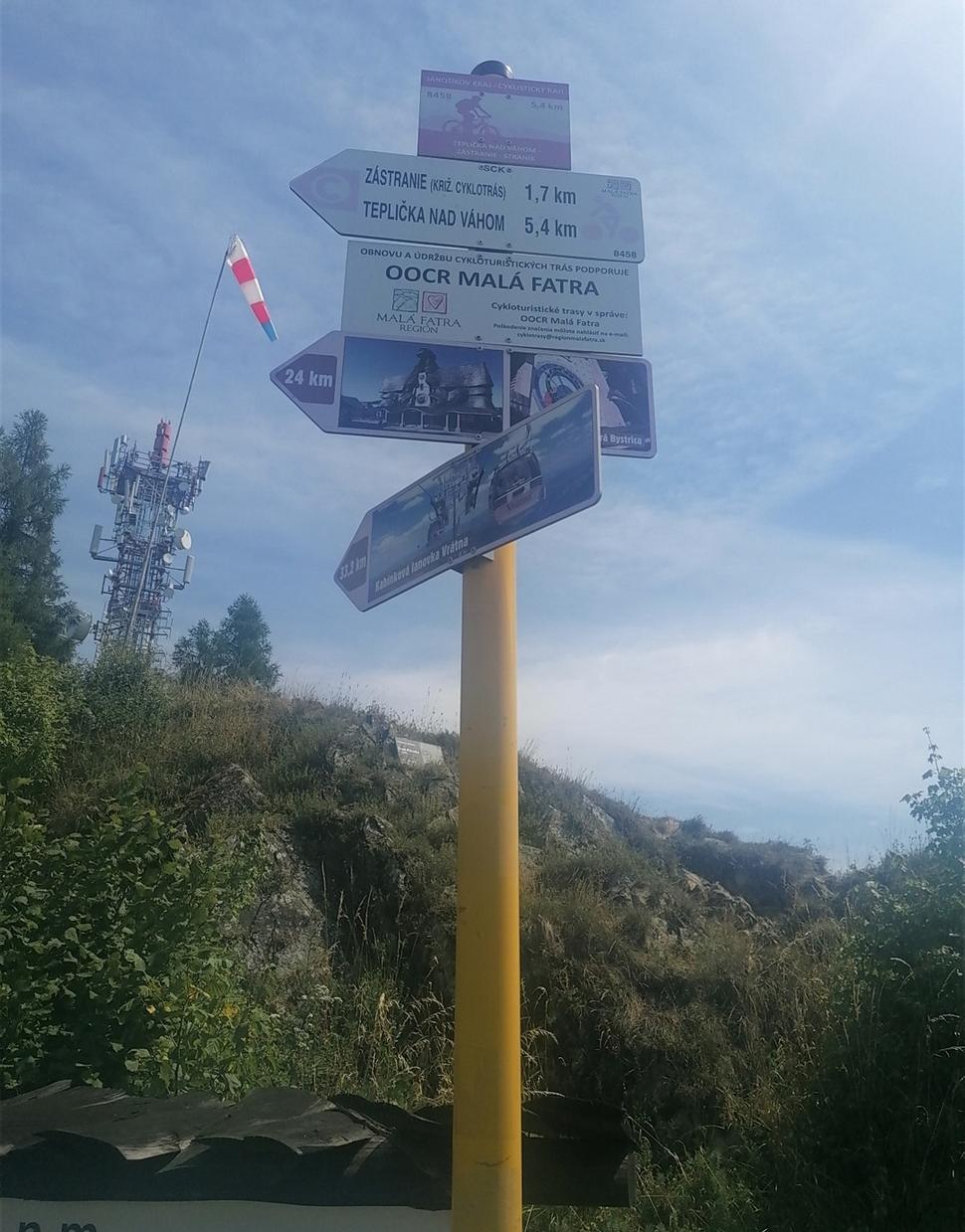 ... a vrcholový smerovník.