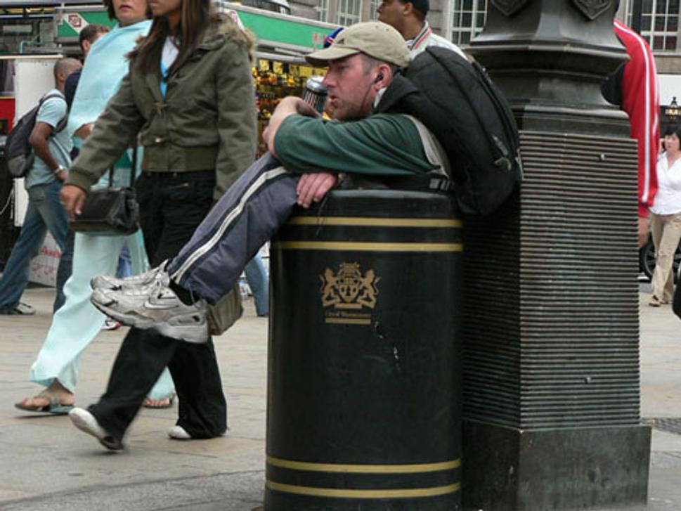 A man with a can in a can