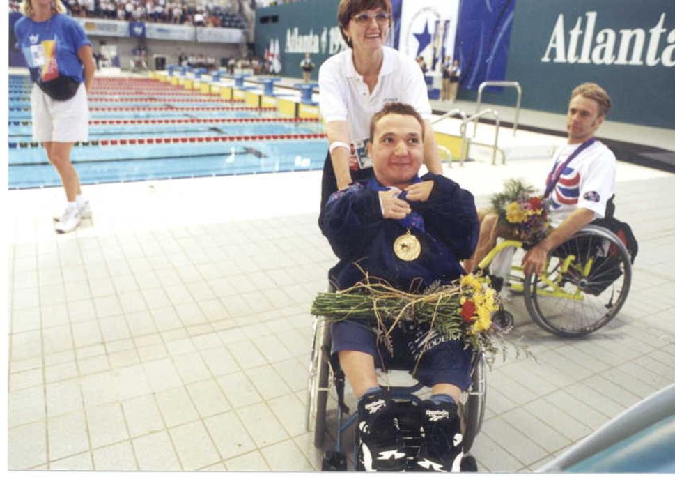 Andrej Zaťko s trénerkou a zlatou medailou