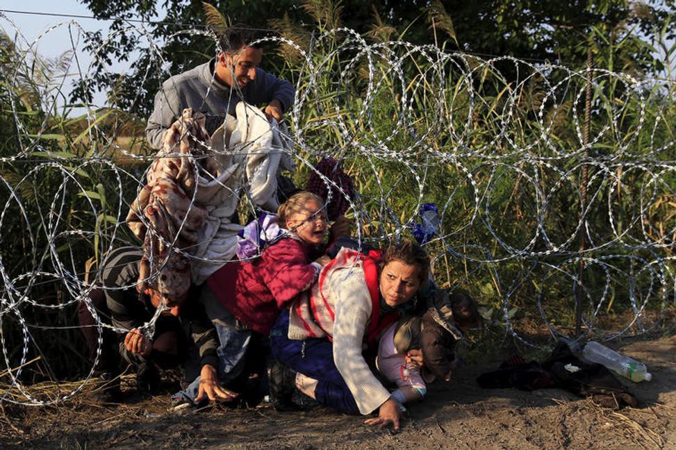 Migranti a utečenci